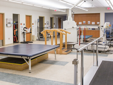 View of therapy gym and equipment from across the room